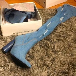 Thigh high ripped jean boots